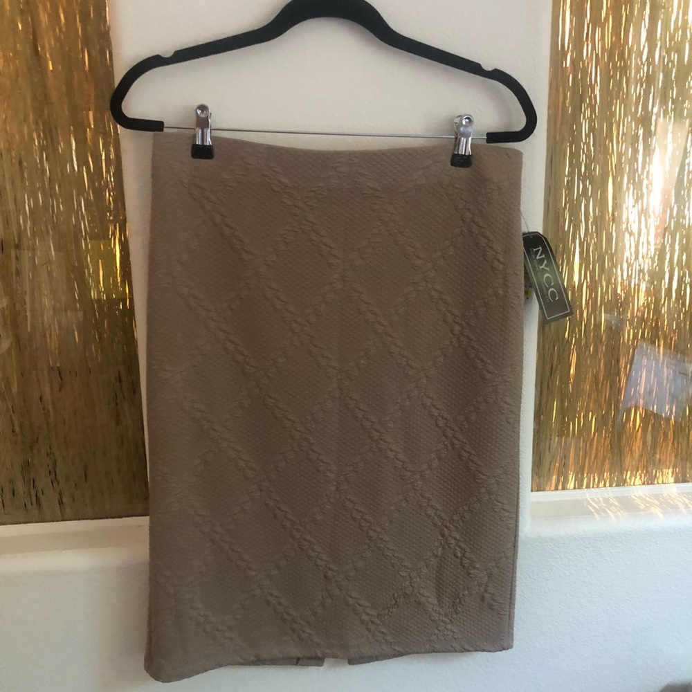 3/$20 - Knee length tan knit skirt (New with tags)